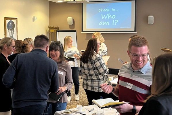 Participants engaged in a lively discussion during a group exercise.